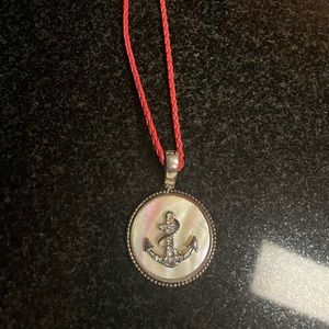 Nautical necklace with anchor pendant on red rope chain